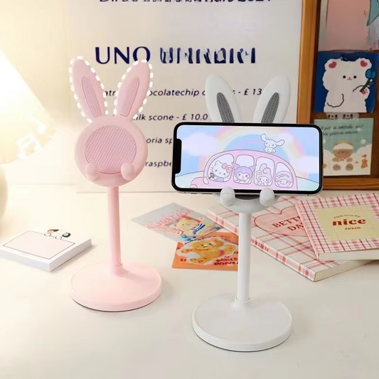The cute bunny mobile phone stand can lift and adjust the accessories of the desktop phone stand; it opens the phone.