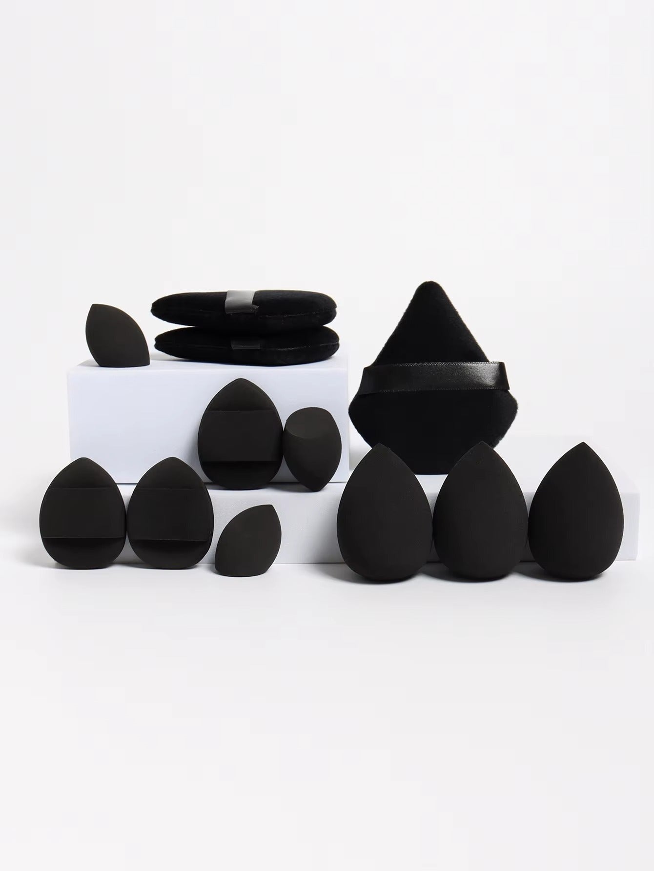 12-piece multi-purpose makeup sponge set, consisting of 3 loose powder puffs, 3 mini air cushion puffs, 3 beauty eggs, and 3 mini beauty sponges.