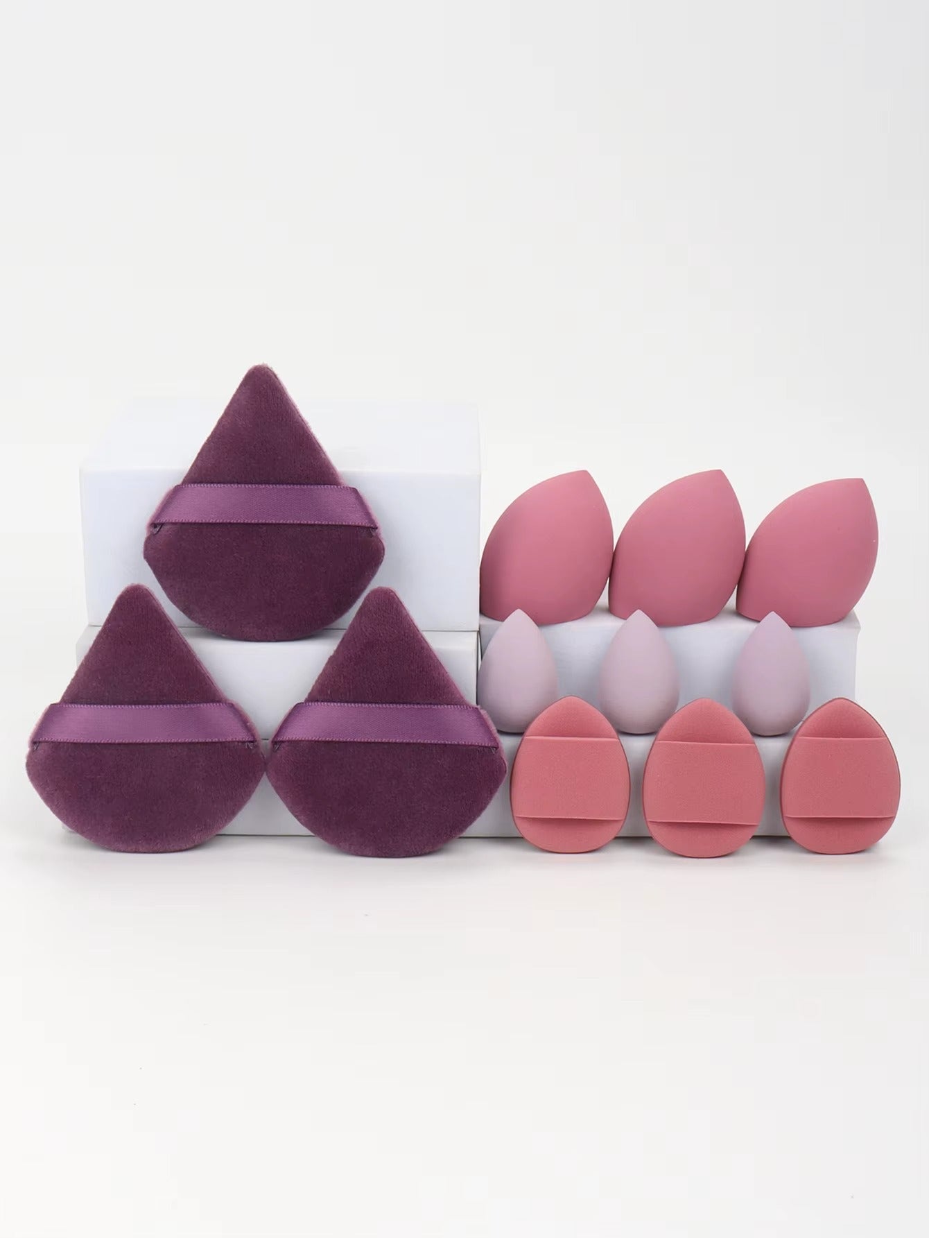 12-piece multi-purpose makeup sponge set, consisting of 3 loose powder puffs, 3 mini air cushion puffs, 3 beauty eggs, and 3 mini beauty sponges.