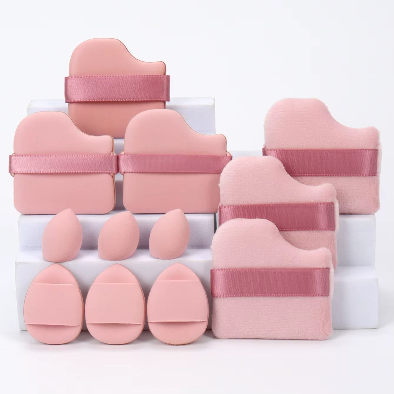12-piece multi-purpose makeup sponge set, consisting of 3 loose powder puffs, 3 mini air cushion puffs, 3 beauty eggs, and 3 mini beauty sponges.