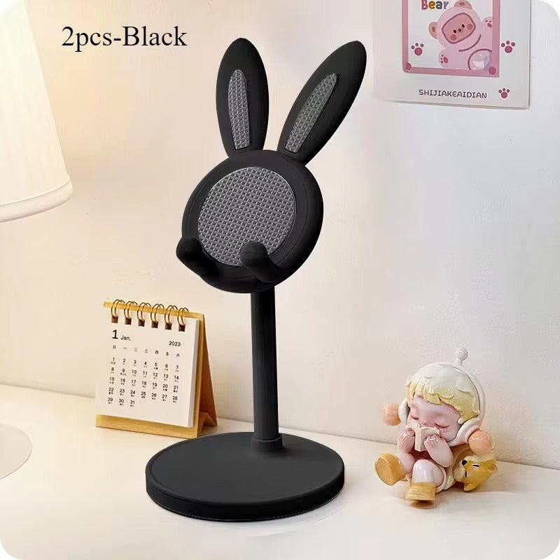 The cute bunny mobile phone stand can lift and adjust the accessories of the desktop phone stand; it opens the phone.