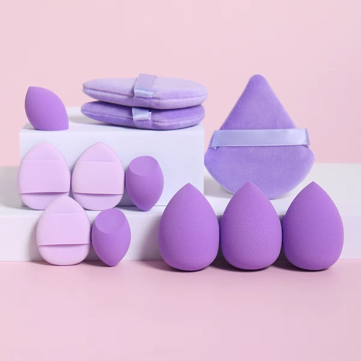 12-piece multi-purpose makeup sponge set, consisting of 3 loose powder puffs, 3 mini air cushion puffs, 3 beauty eggs, and 3 mini beauty sponges.