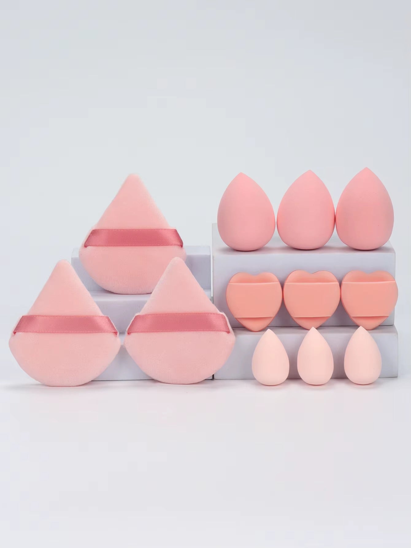 12-piece multi-purpose makeup sponge set, consisting of 3 loose powder puffs, 3 mini air cushion puffs, 3 beauty eggs, and 3 mini beauty sponges.