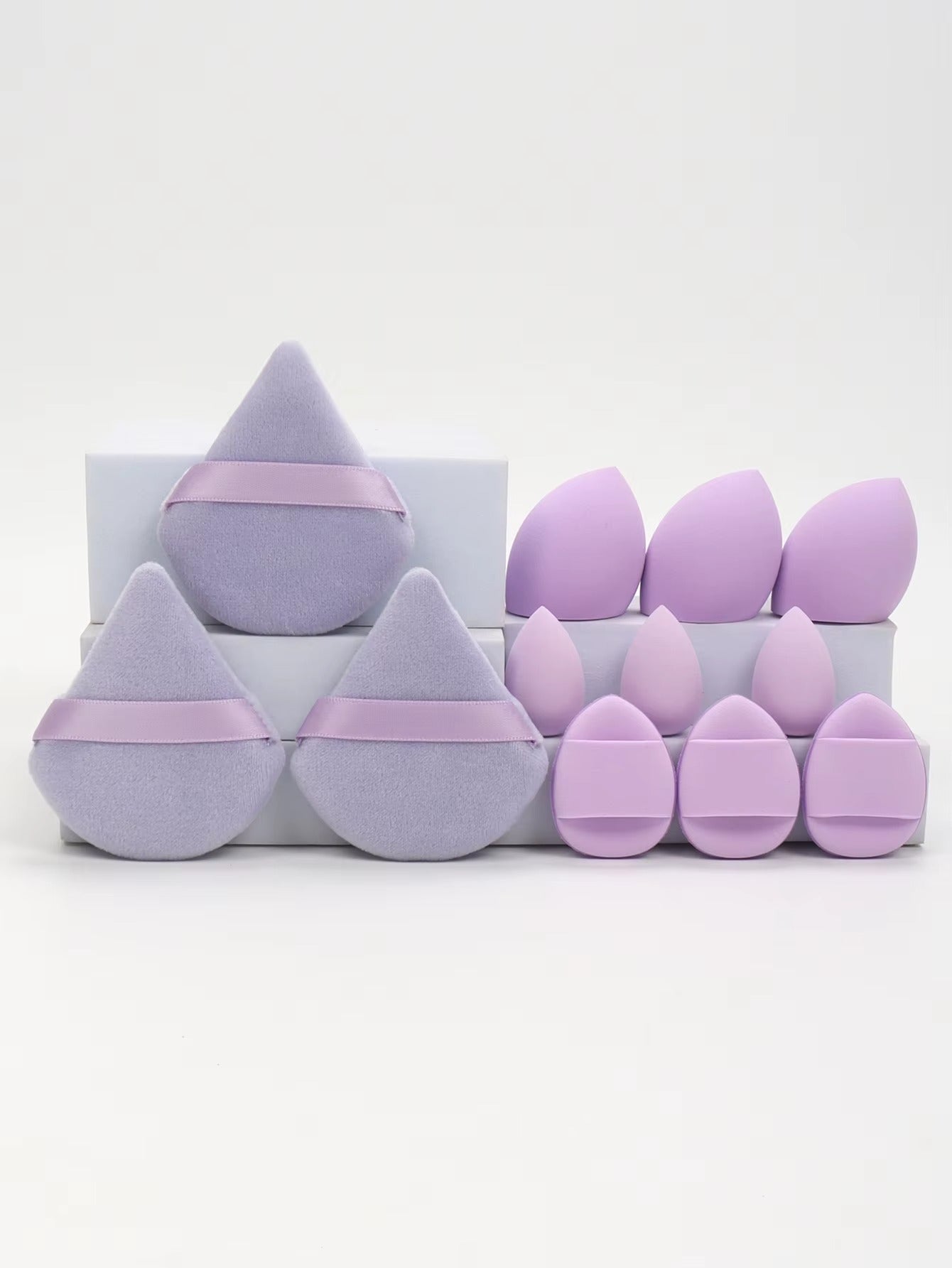 12-piece multi-purpose makeup sponge set, consisting of 3 loose powder puffs, 3 mini air cushion puffs, 3 beauty eggs, and 3 mini beauty sponges.