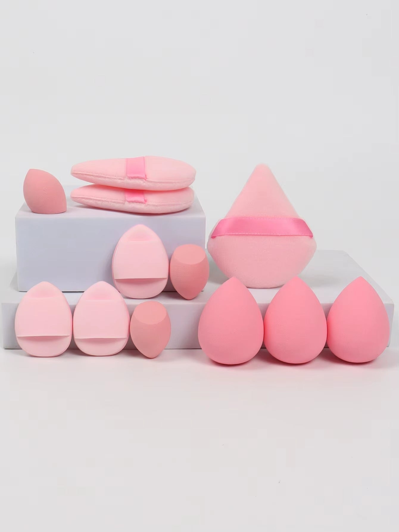12-piece multi-purpose makeup sponge set, consisting of 3 loose powder puffs, 3 mini air cushion puffs, 3 beauty eggs, and 3 mini beauty sponges.